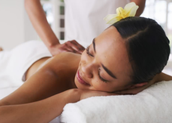 a black lady getting a back massage 1200 x 630 px